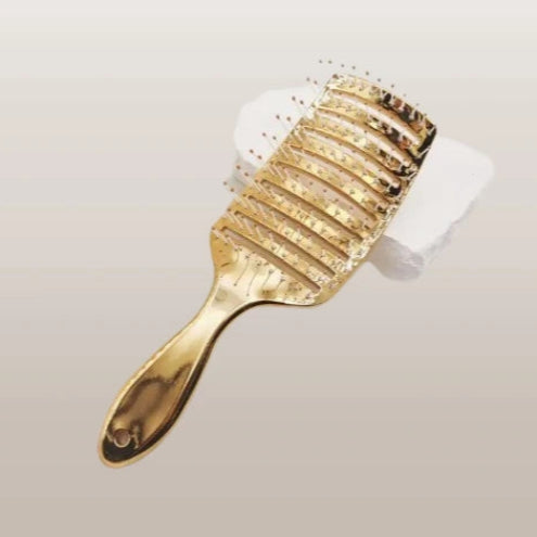 Golden hairbrush