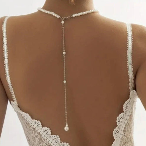 Necklace with long thin chain with pearls on the back